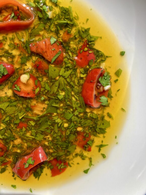 colatura with chili peppers and parsley 