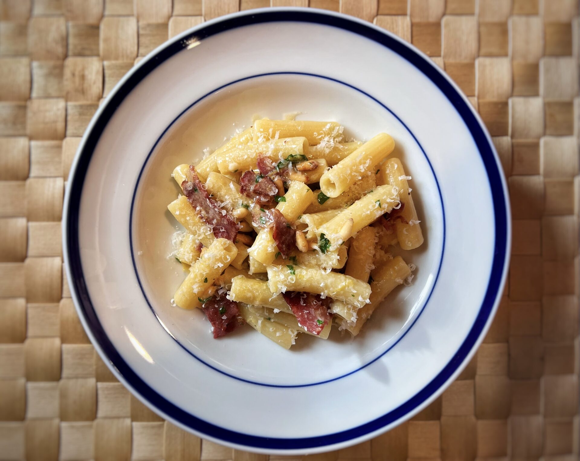 pasta with bacon, cheese, lemon and pinenuts